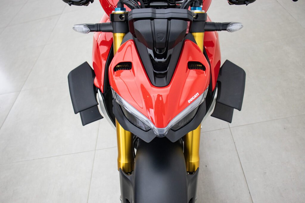 the front of a red motorcycle